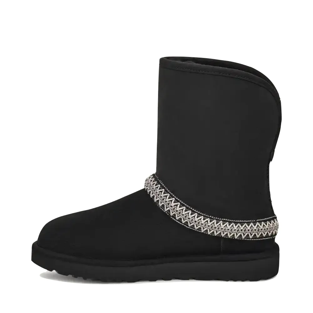 UGG Women's Classic Short Crescent Sheepskin Boot in Black